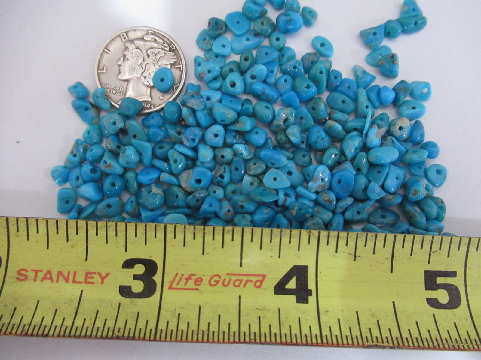 SLEEPING BEAUTY TURQUOISE 1/2 OZ SMALL DRILLED NUGGETS 4X3mm TO 7X4mm #642
