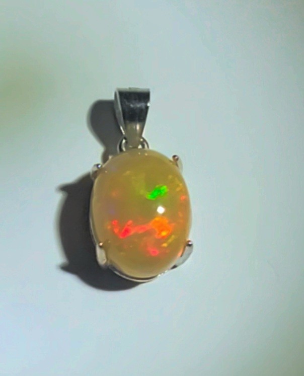 Ethiopian Honey Hue Fire Opal Natural 10X8/925 Sterling Silver (SEE DETAILS)