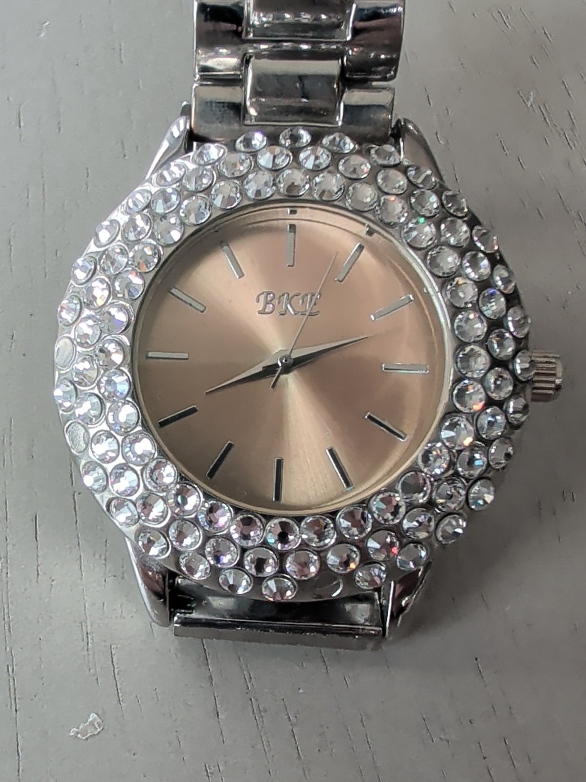 BKE Buckle Watch Women’s ROSE Tone Crystal Accent Bling New battery 6.5″ Band