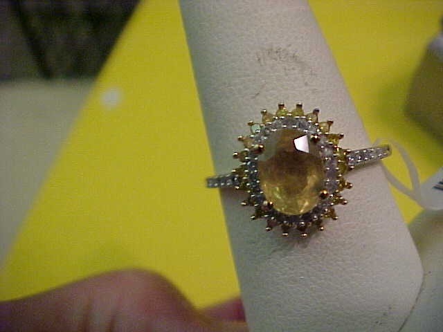 Size 10 Madagascar Yellow Sapphire, Yellow and white diamond (IR) 0.45 cts.