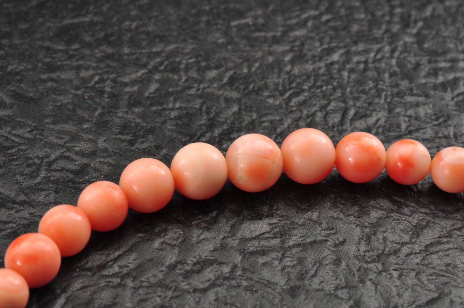 Salmon pink coral Necklace and ear clip set (total 116ct) with Certificate case.