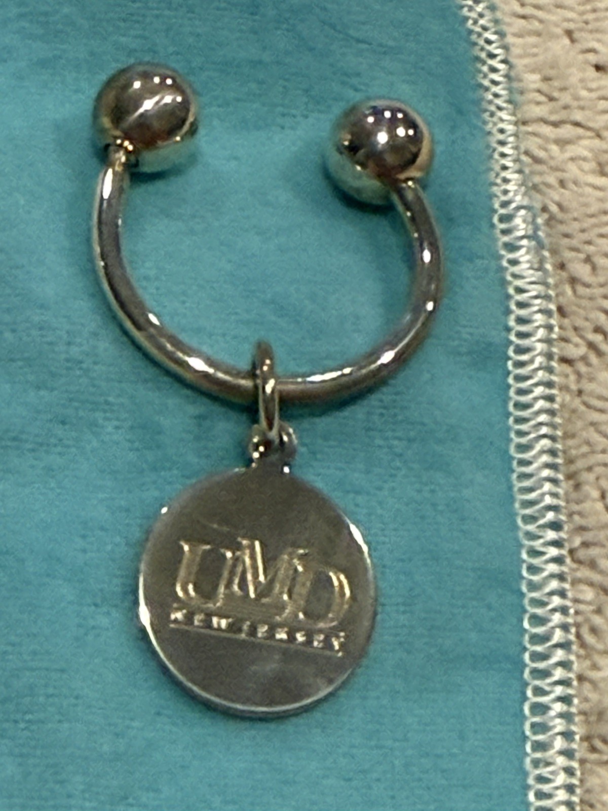 Tiffany & Co Sterling Silver Horseshoe Style Key Ring w/UMDNJ Charm Pouch & Box