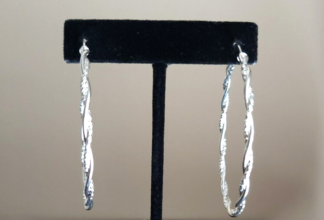 Erick’s Sterling Silver Braided 2 1/8 in. wide Hoop Earrings Taxco.925