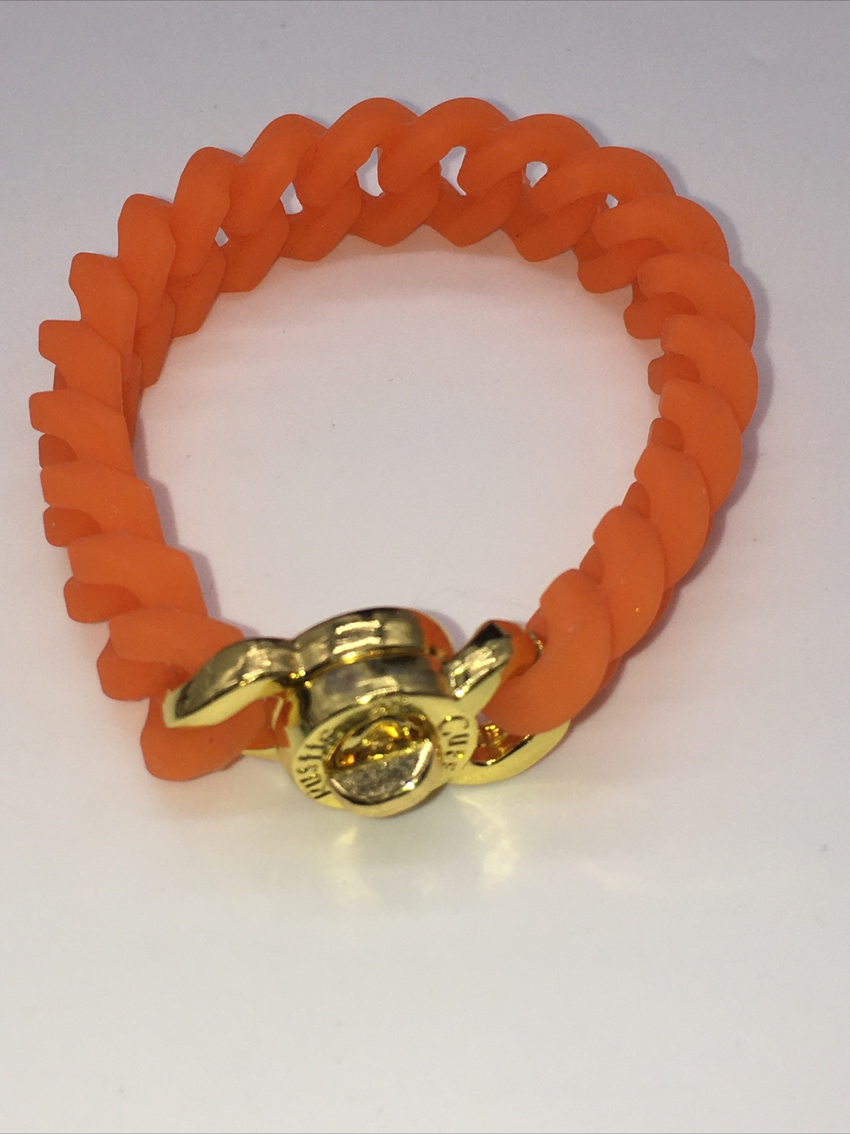 Rustic Cuff Gold Tone Logo Turn Lock Orange Silicone Stretch Mock Chain Bracelet