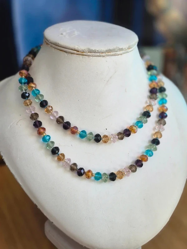 Multi coloured glass cut beads, on long string necklace,