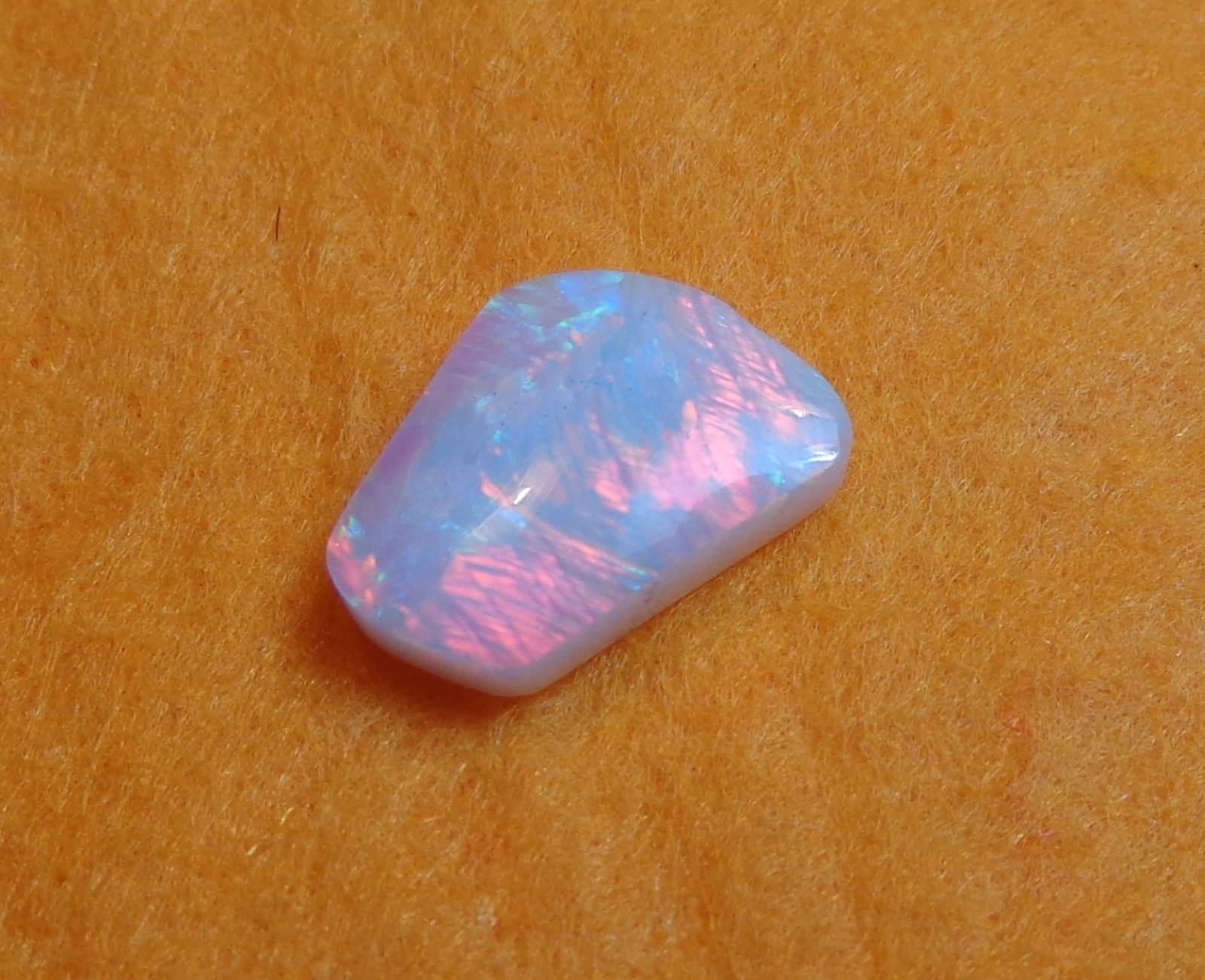 Spencer Idaho Opal Solid 9X15 mm with Unique Pattern and Red, Green, & Gold Fire
