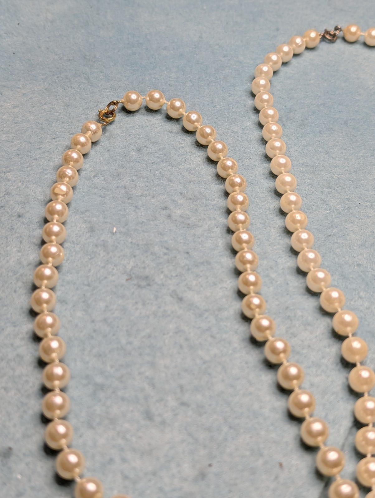 Two Elegant Strands of Classic Fashion White And Off White Faux Pearls