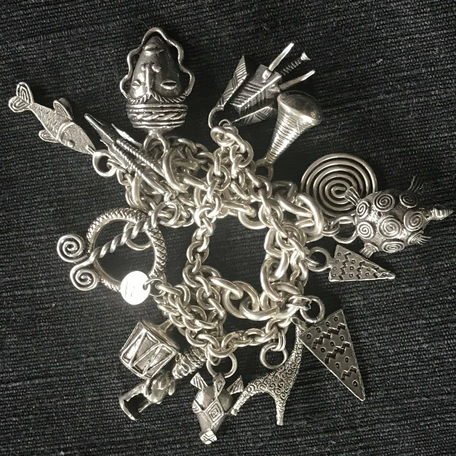SUSAN CUMMINGS. SS 3 ROW HEAVY LINK BRACELET. 170 GRAMS. ENDANGERED SPECIES