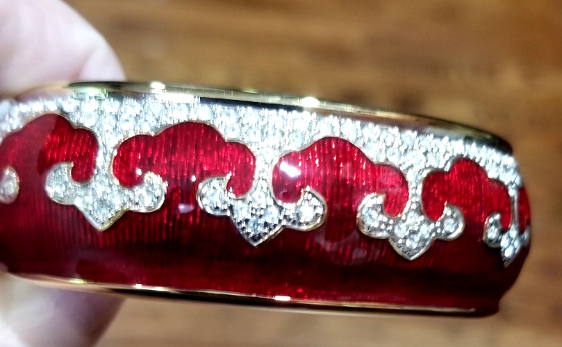 Bejeweled cuff bracelet with Red enamel and Gold tone metal Mint condition