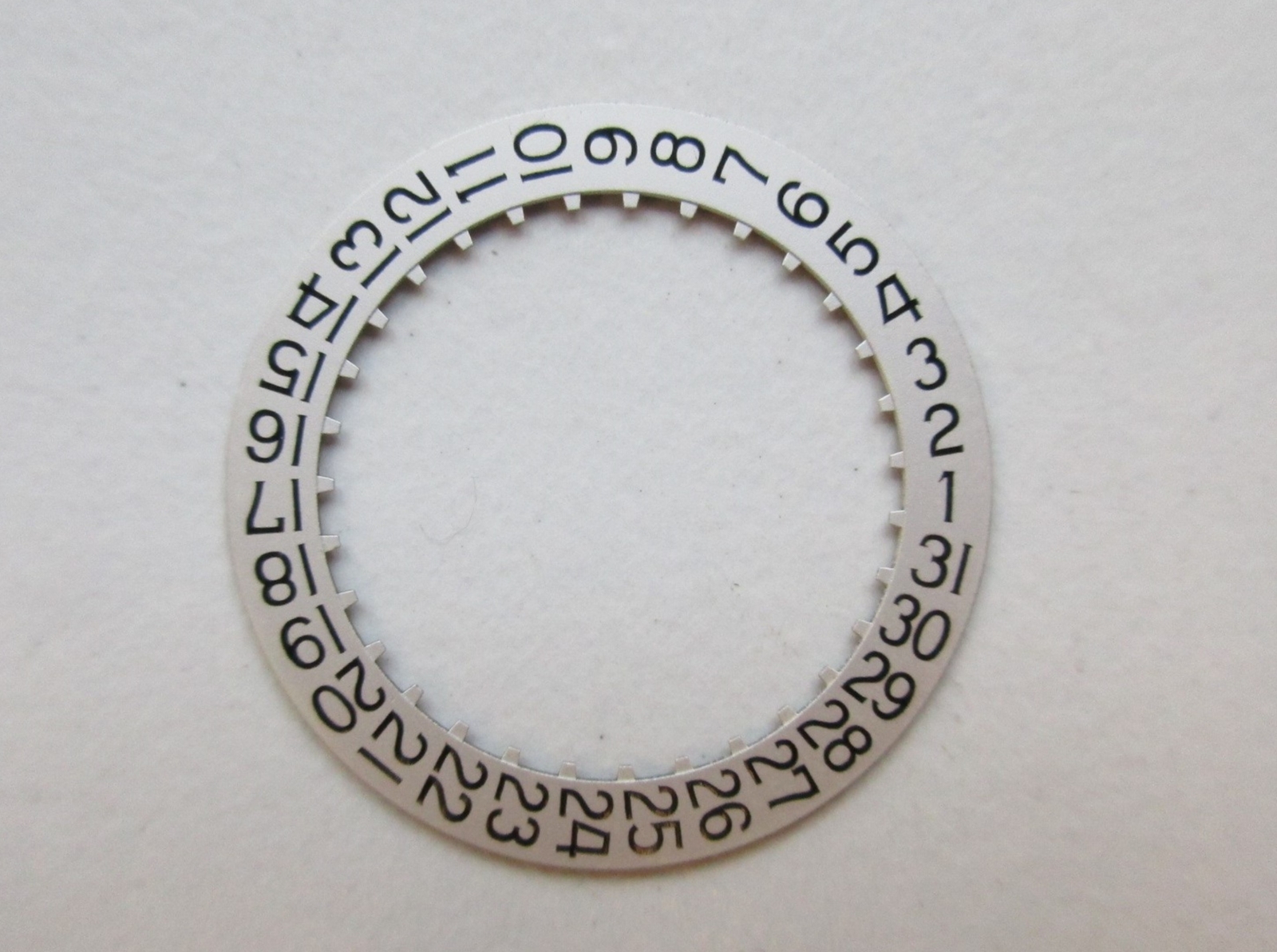 ETA 11½”‘ cal. 2784 Silver DATE disk pos. at 3 Swiss watch movement part