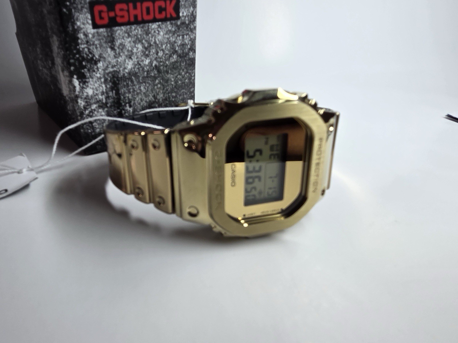 Casio G-Shock GM-5600YMG-9 Gold Metal G-Steel Digital Watch Brand New