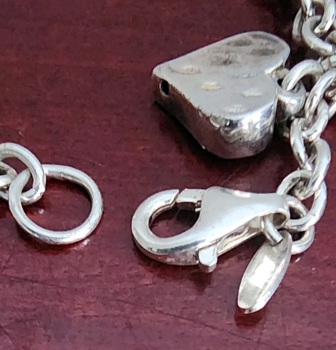 JCM 925 STERLING SILVER HEART CHARMS BRACELET. 8″. 20.80GRS. MADE IN MAURITIUS
