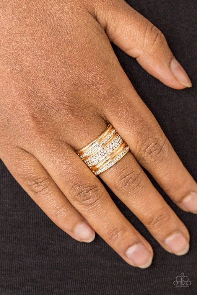 Top Dollar Drama Gold Stretch Ring Fits size 6 to 10