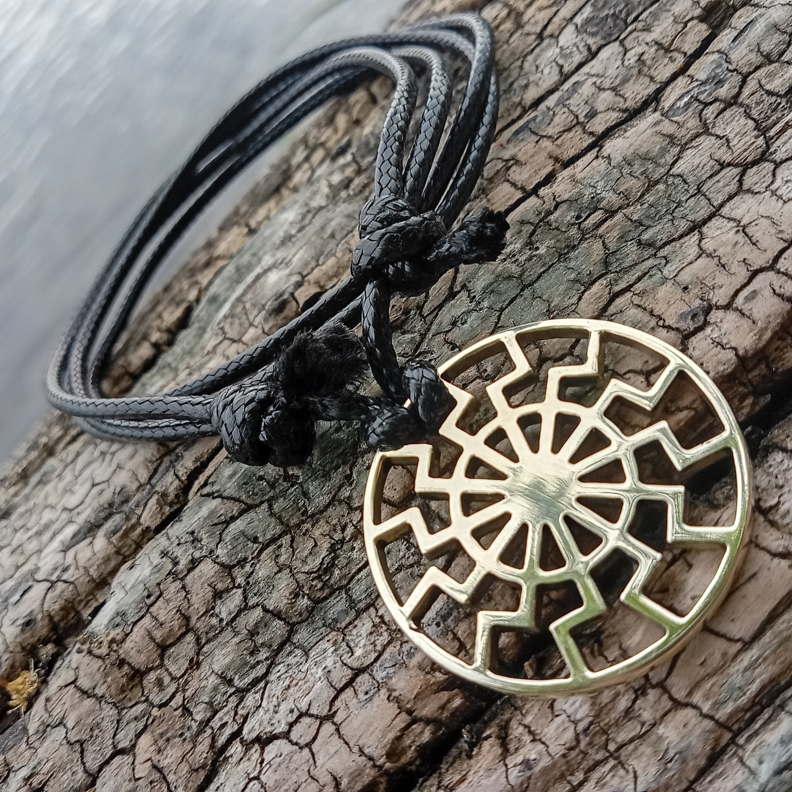 Black Sun Pendant Necklace – Brass Sonnenrad Medallion on Black Cord