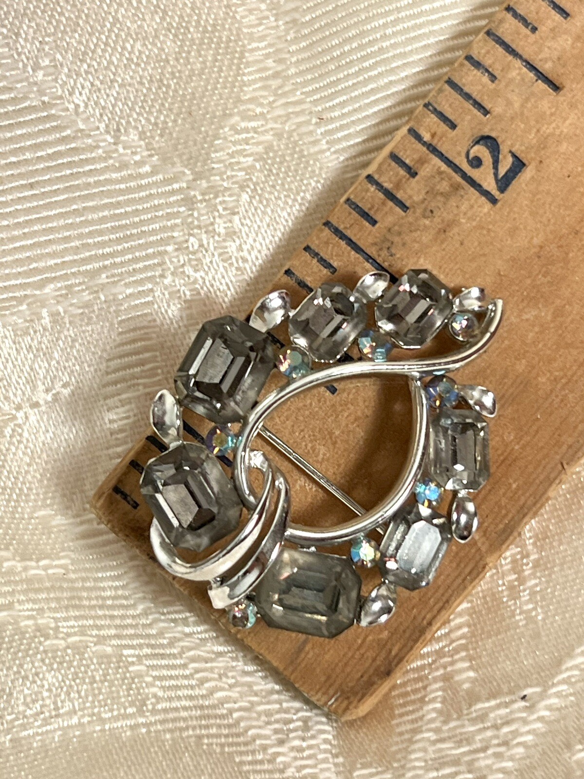 Vintage Lisner Swirl Silver Gray Blue Brooch Pin Rhinestones Emerald Cut