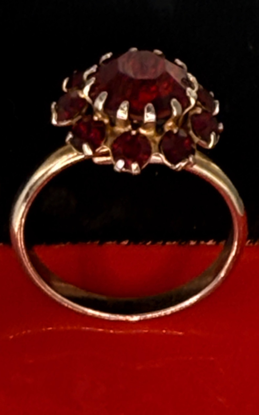 Deep Burgundy ring features a cluster of red rhinestones in a gold-tone setting.