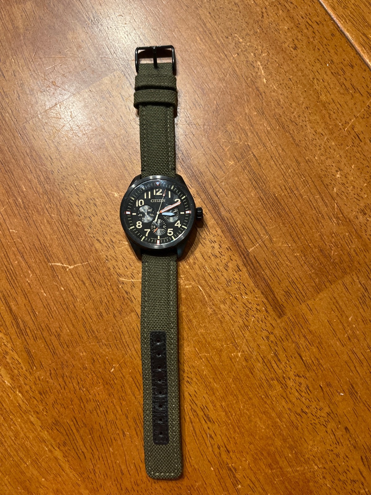 Citizens Watch black face with green nylon band eco drive no battery required
