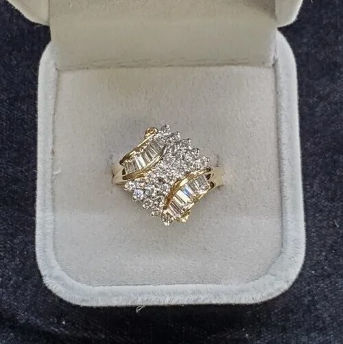 Ladies Diamond Cluster. 14 Karat Yellow Gold. Approx 1 Carat T.W Diamonds….