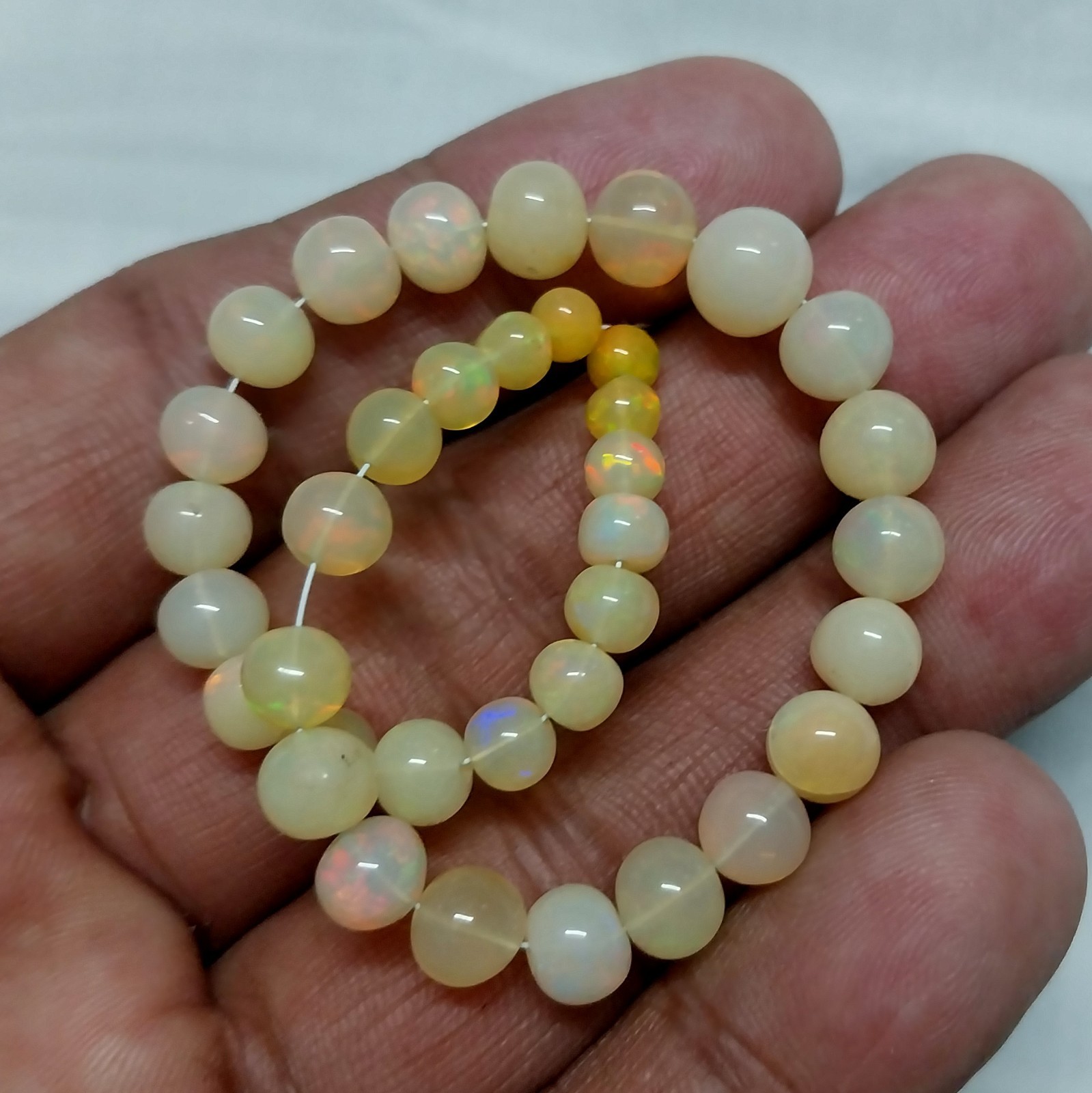 33 Carat 4.5 to 8 MM Natural Smooth Ethiopian Opal Ball Shape 8 inch Beads