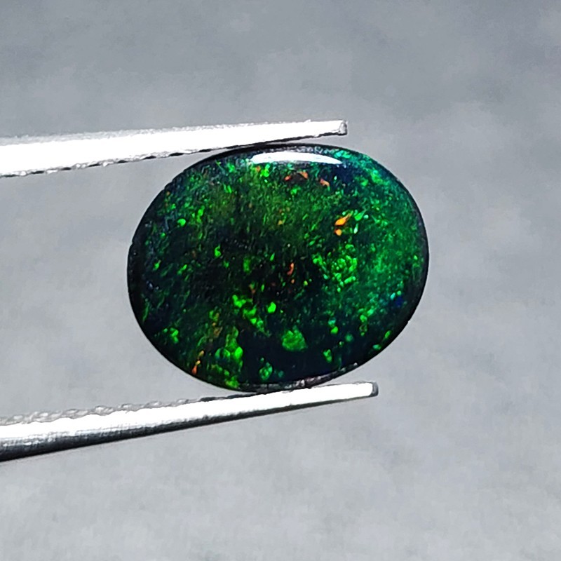 Ethiopian Welo Black Opal AAA+ Oval Cabochon Strong Green Play Loose 1.20Ct Gem