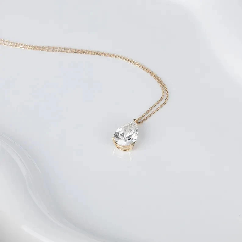 2CT Pear-Cut Moissanite Solitaire Pendant 14K Yellow Gold Plated 18″ Chain