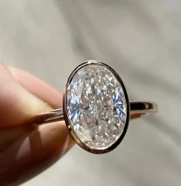3Ct Oval Cut D/VVS1 Moissanite Bezel Set Engagement Ring 14k Yellow Gold Plated