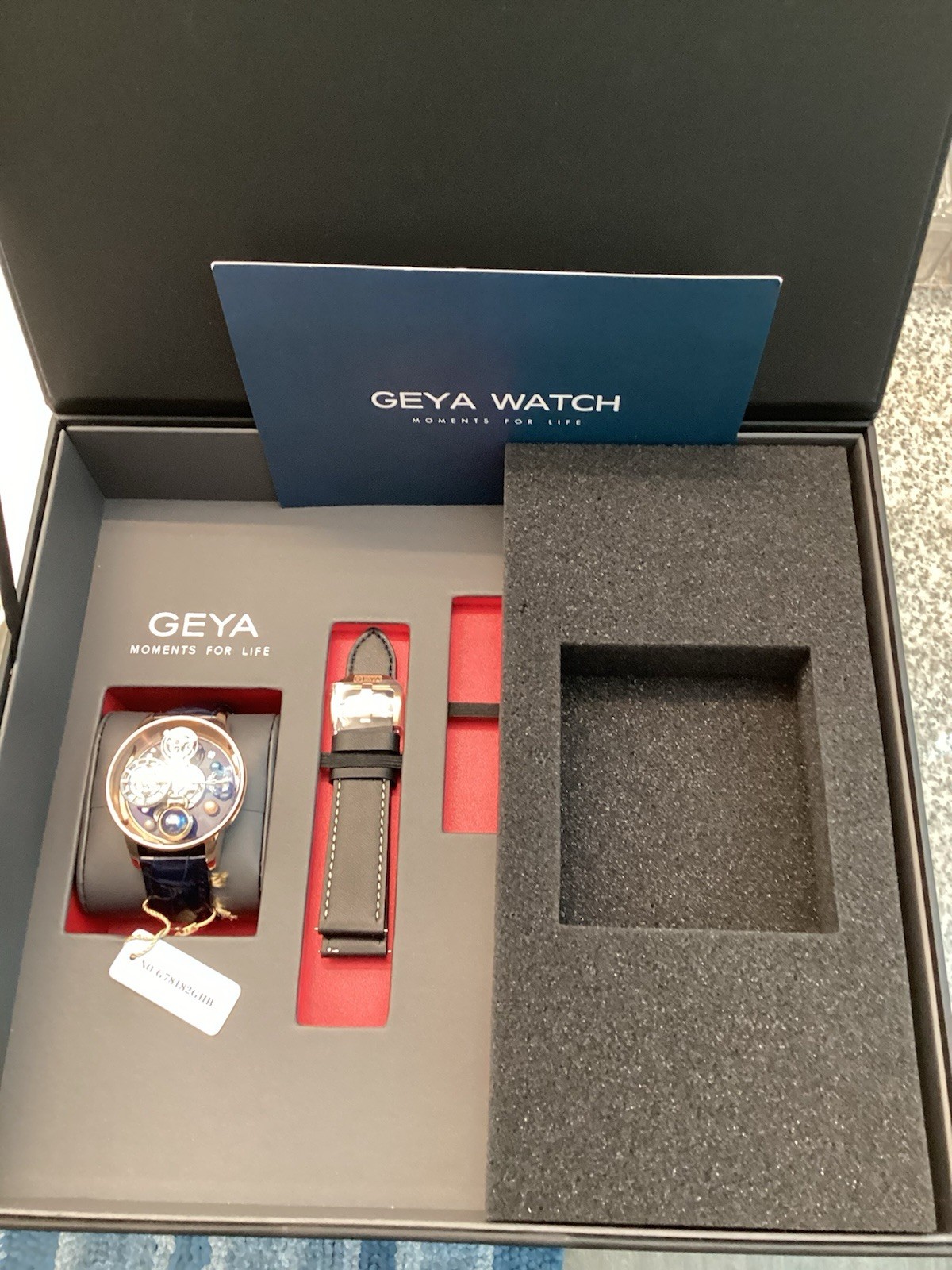 GEYA Men’s Automatic Skeleton Watch Blue Dial Gold Tone 44mm Box & Papers