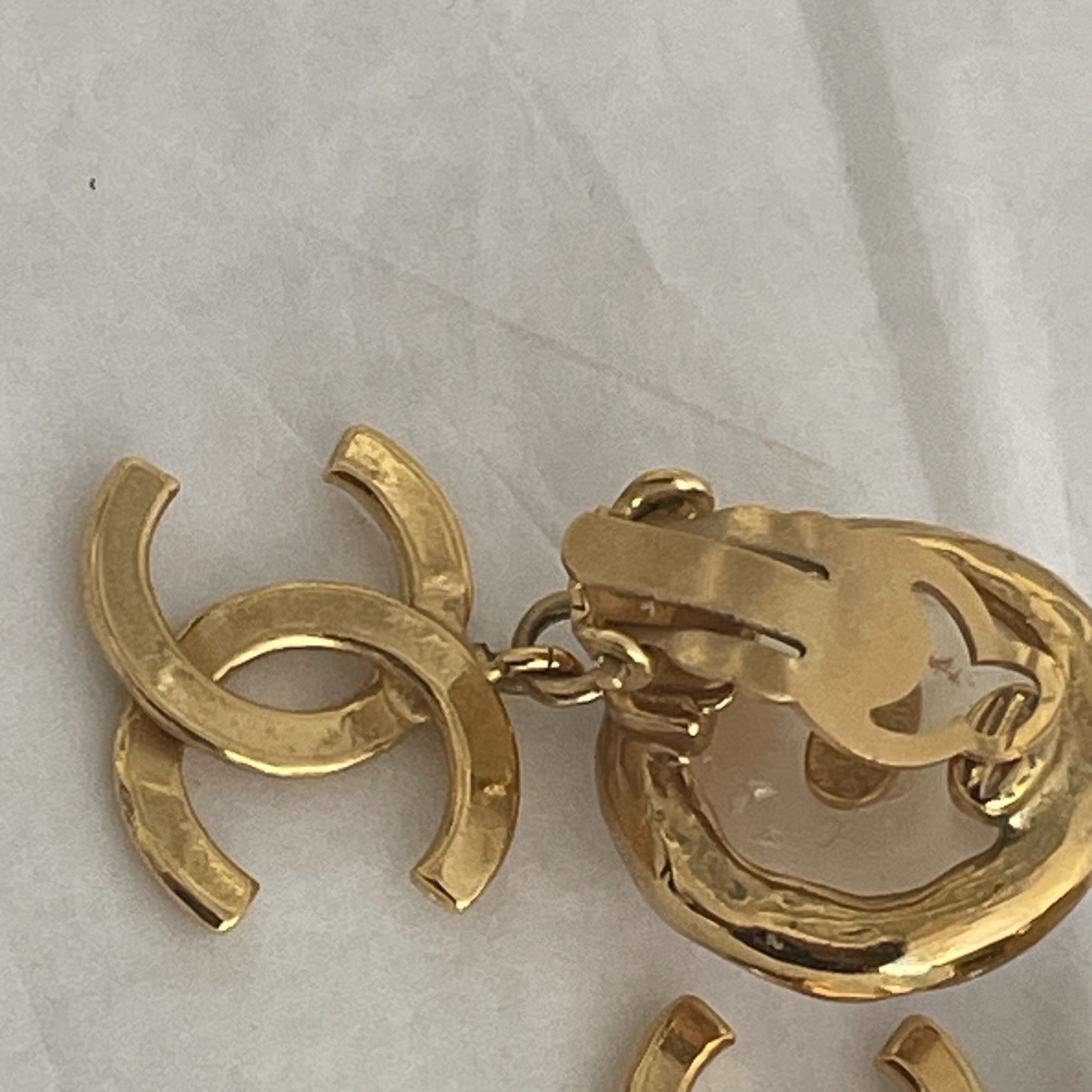 Auth. vtg CHANEL 1995 gold 3D CC logo dangle with round moonlight stone stamped