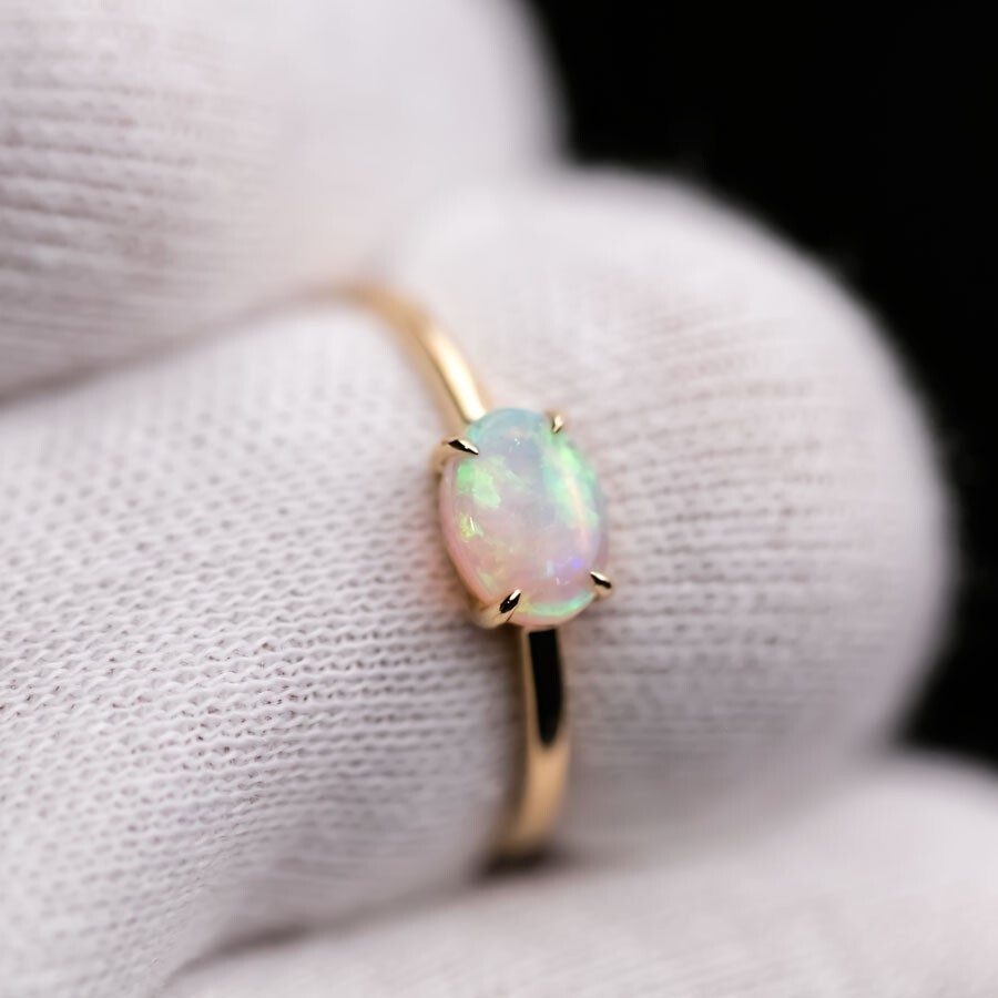 18K Yellow Gold Engagement Ring featuring an Oval Shaped Australian Solid Opal