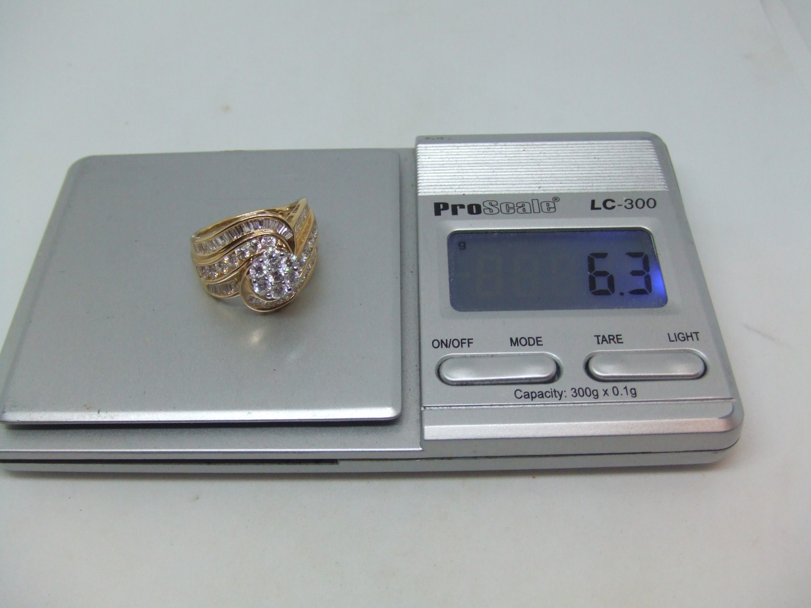 10k y. g. 1.44 ctw diamond cluster ring size 7.25