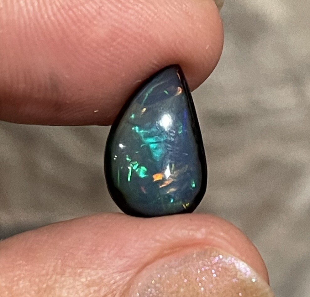 2.65ct 15x10x3.8mm Evil Eye Smoked Ethiopian Welo Opal Teardrop Cabochon Gem