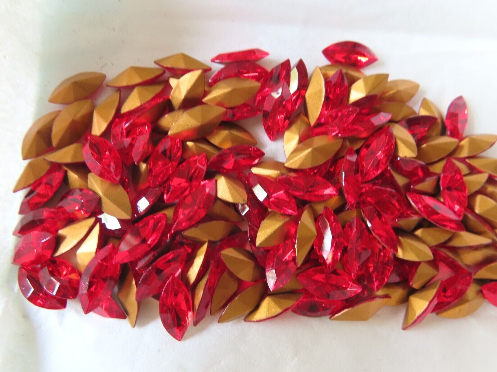 36 Swarovski Navettes in 15x7mm Light Siam. #4200/2