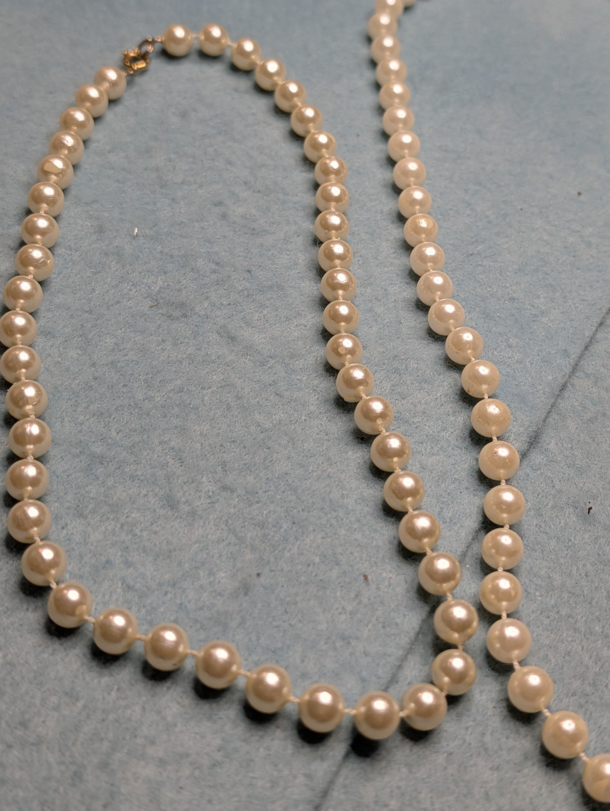Two Elegant Strands of Classic Fashion White And Off White Faux Pearls