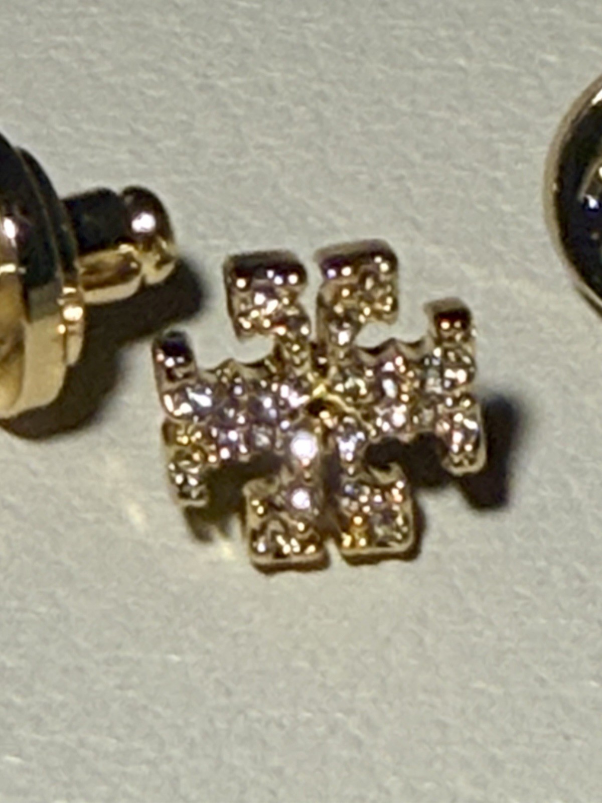 Tory Burch Women’s Gold-Tone Pavé Crystal Logo Stud Earrings.