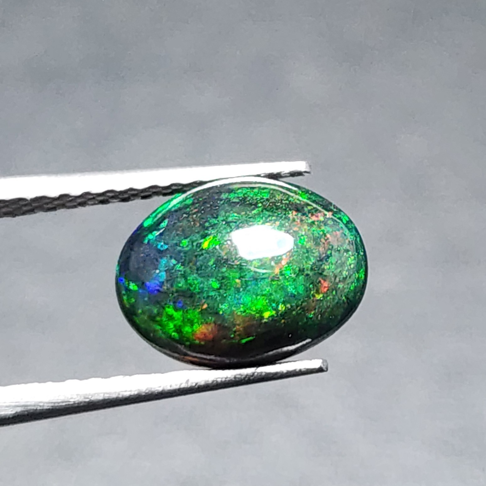 Natural Welo Black Opal Ethiopia Oval Cabochon Vivid Green Fire Gemstone 1.20Ct