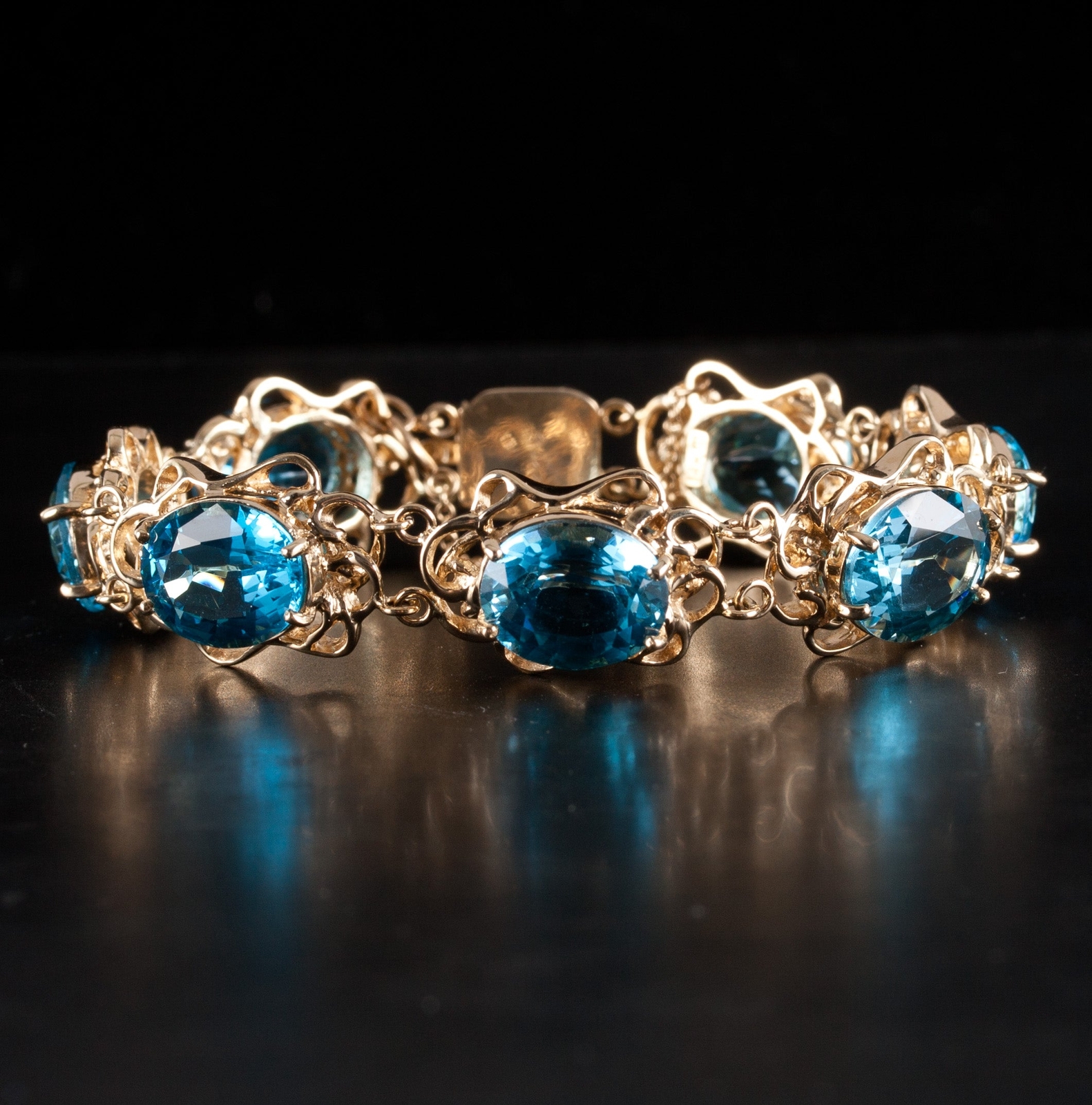 14k Yellow Gold Large Oval Swiss Blue Topaz Bracelet 42.0ctw 29.6g 6.5″ Length