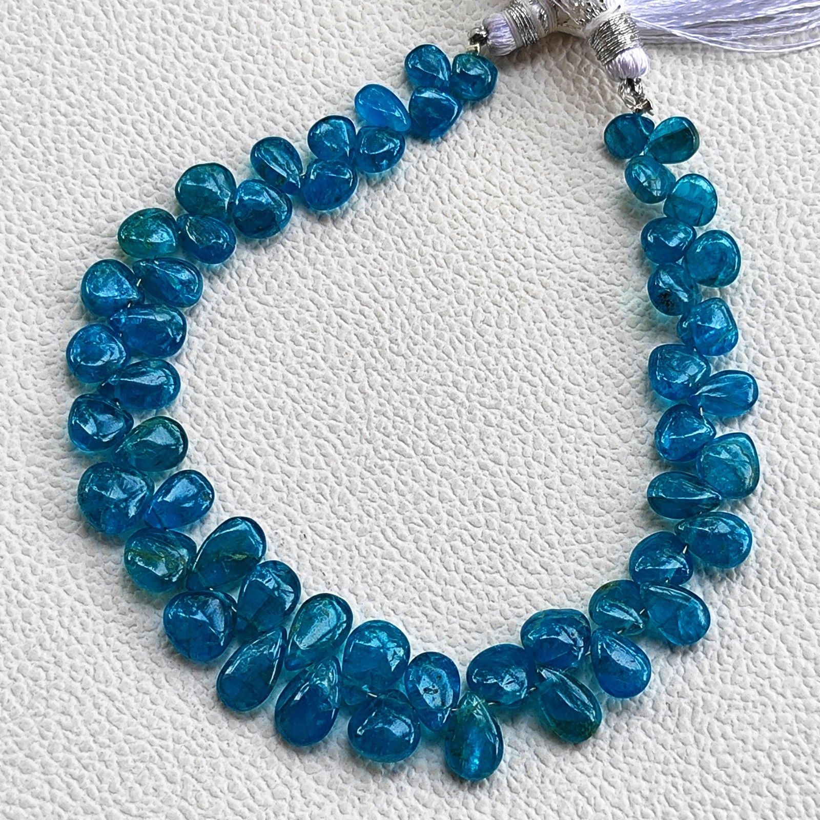 Madagascar Neon Blue Apatite Smooth Pear Shape Beads 6×4 to 8x6mm 7.5″ Strand