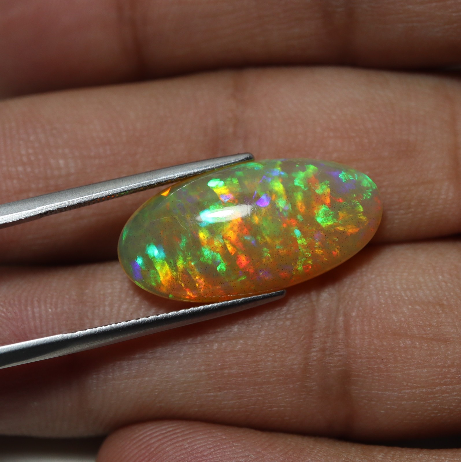 8.8Cts Natural AAA Ethiopian Opal Oval Flashy Rainbow Fire Cabochon 23.1×11.8 MM