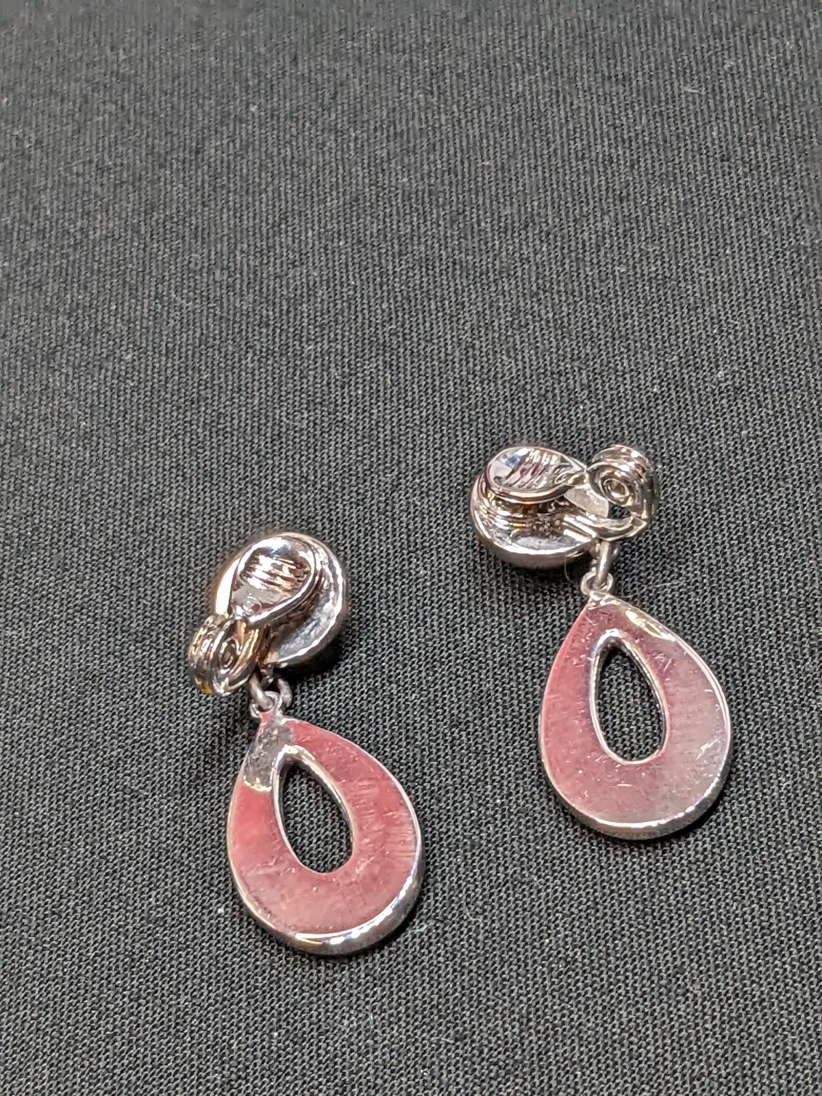 Vintage Monet Teardrop Earrings Dangle Clip On Polished Silver Tone Chrome Shiny