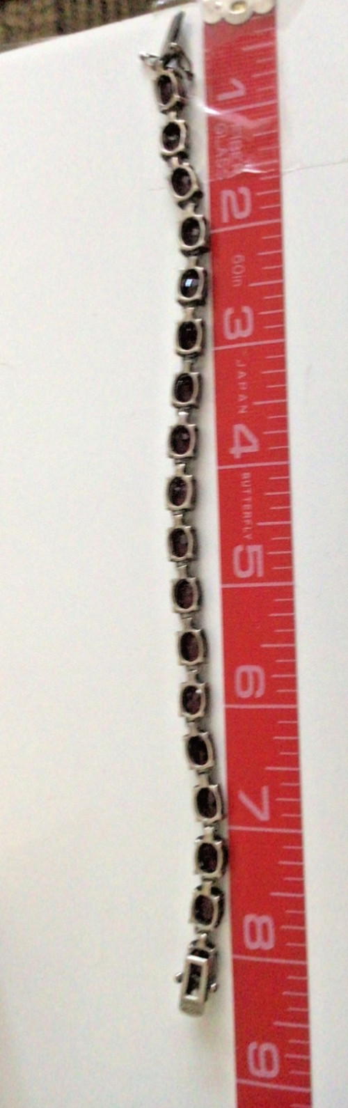STERLING SILVER & GARNET 8” BRACELET – MARKED 925 CNA THAILAND