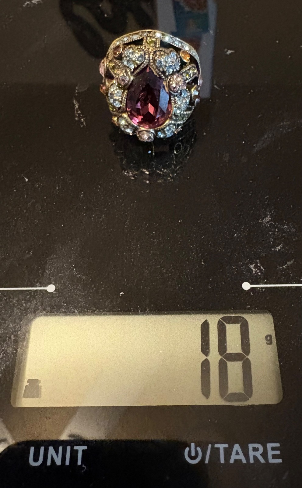 Heidi Daus Ring , weighs 18 grams, multiple stones, see photos for details