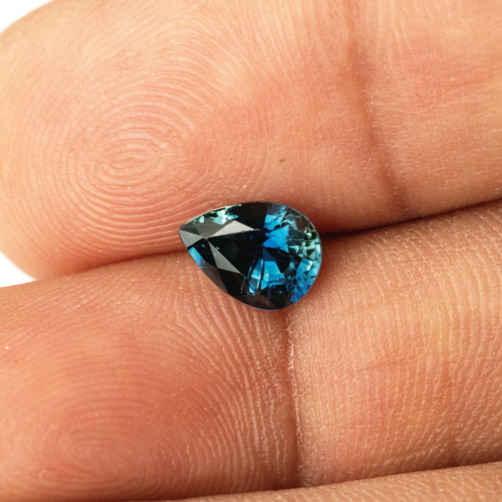 1.35ct Pear Shape Heated Natural Sapphire in Teal Green Peacock Blue Color