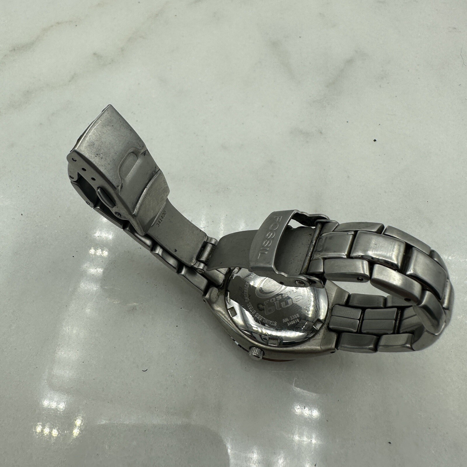 Fossil AM3388 Watch, Purple Dial, Silver Tone, New Battery Sz. 6.25”