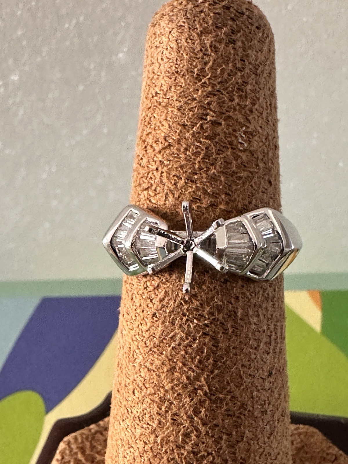 18kt.white gold semi mount ring with baguette diamonds size 7,4.90 gram.