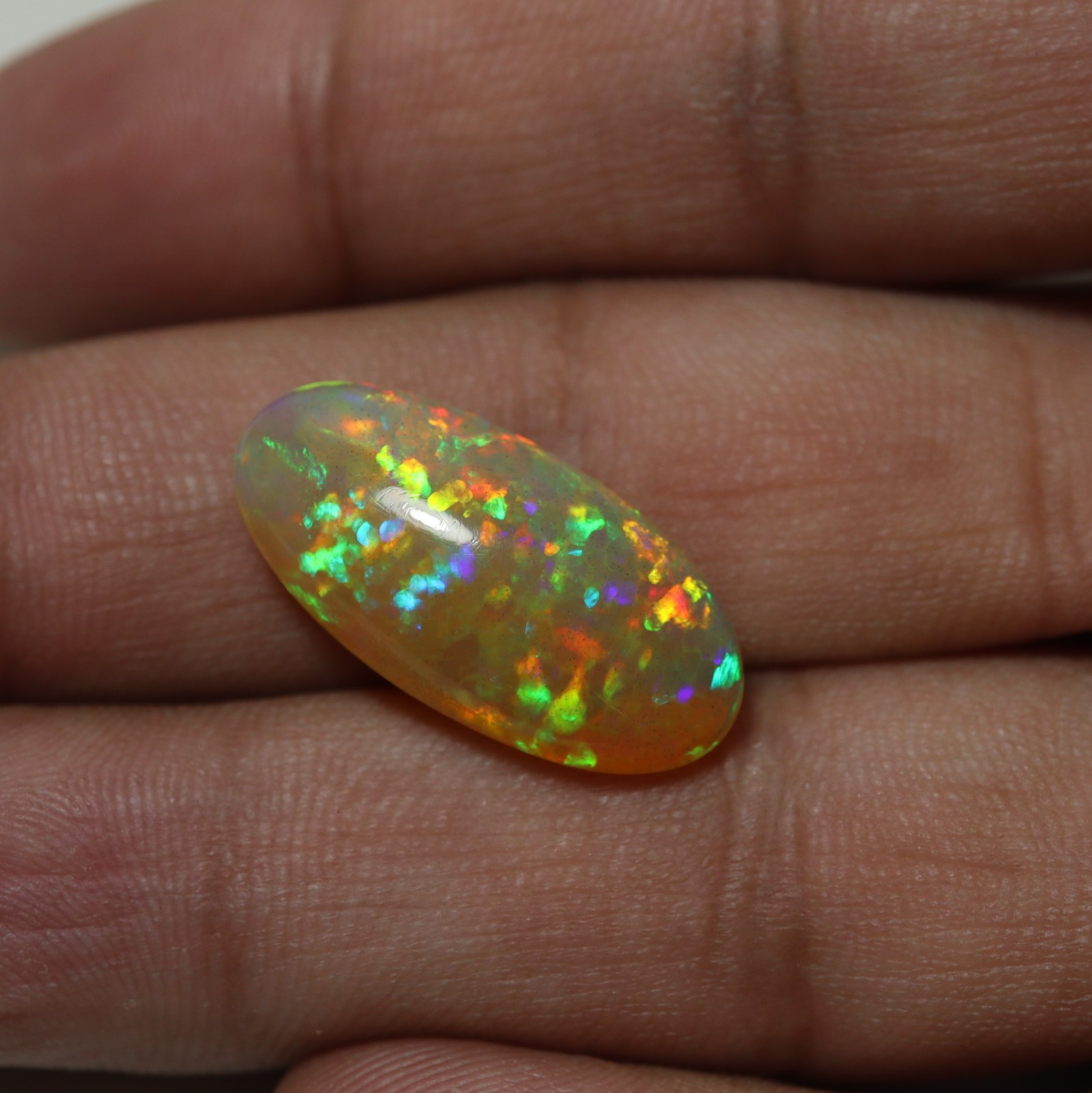 8.8Cts Natural AAA Ethiopian Opal Oval Flashy Rainbow Fire Cabochon 23.1×11.8 MM