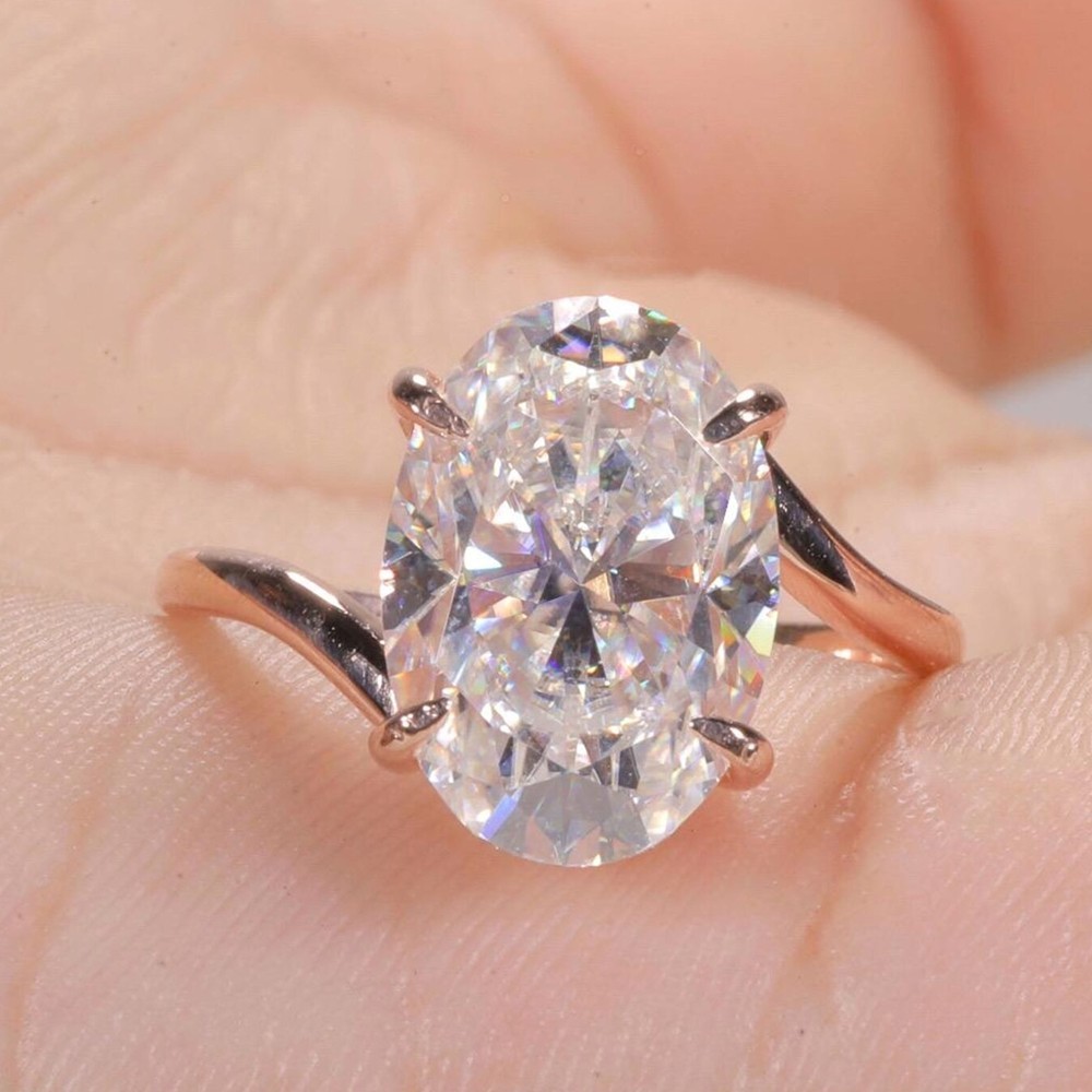 5.50 CTW Oval Cut VVS1 Moissanite Bypass Engagement Ring In 14k Rose Gold Plated