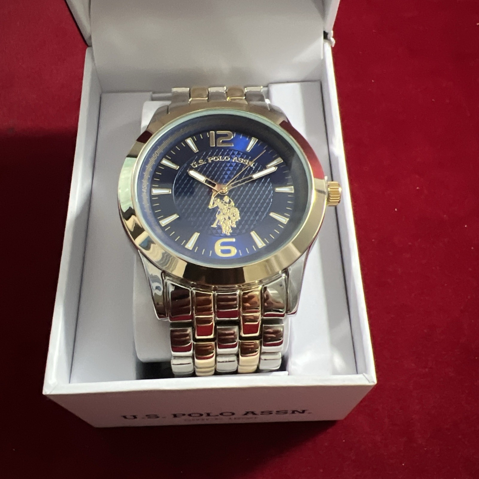 U.S. Polo Assn. Men’s Analog Bracelet Watch Blue Dial with Gold-Tone Bezel