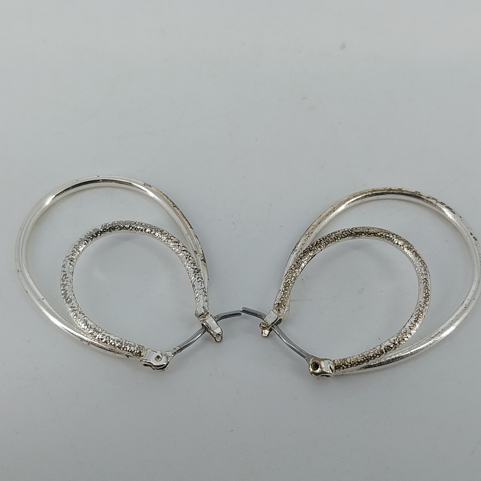 Silver Tone Double Oval Hoop Earrings Textured Inner Hoop Latch Back Jewelry