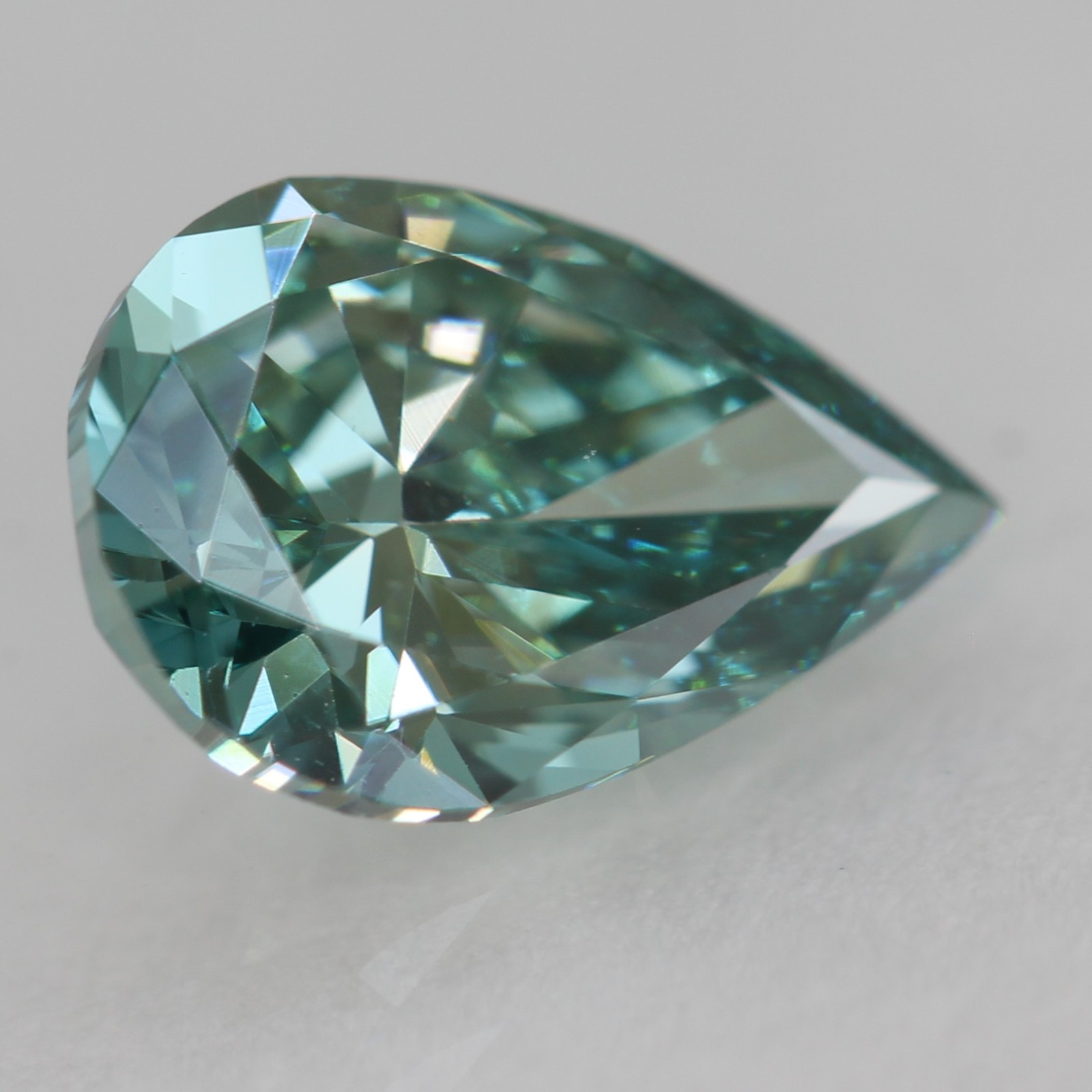 Cert 0.80 Carat Fancy Vivid Blue VVS1 Pear Natural Enhanced Diamond 7.83×5.37mm