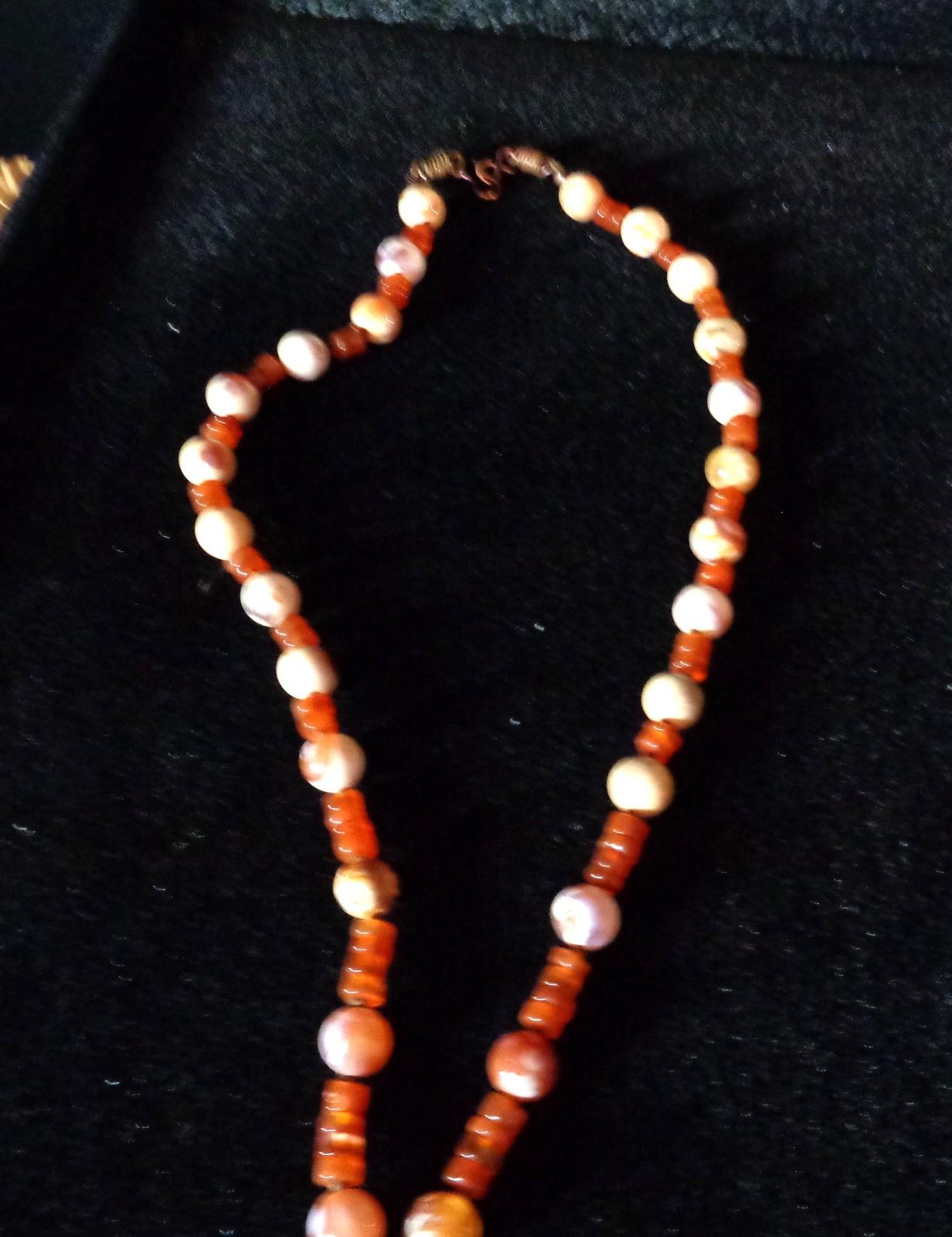 Artisan crafted,3” caged faceted red agate and carnelian pendant, on 18” hand kn